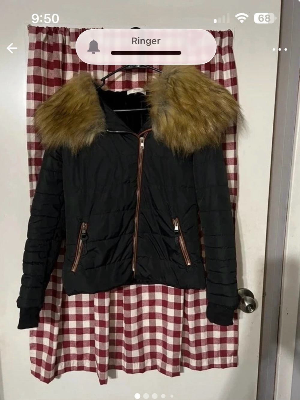 Womes very nice puffer jacket by Apoctita’s size med fur color is removable